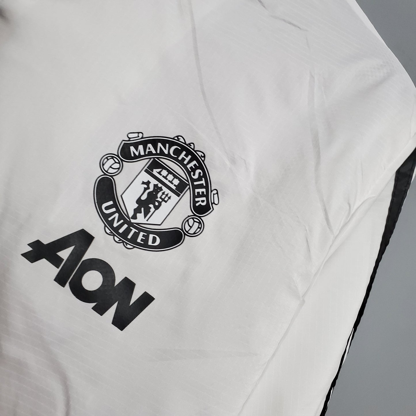 20-21 Windbreaker Manchester United white - black border S- 2XL