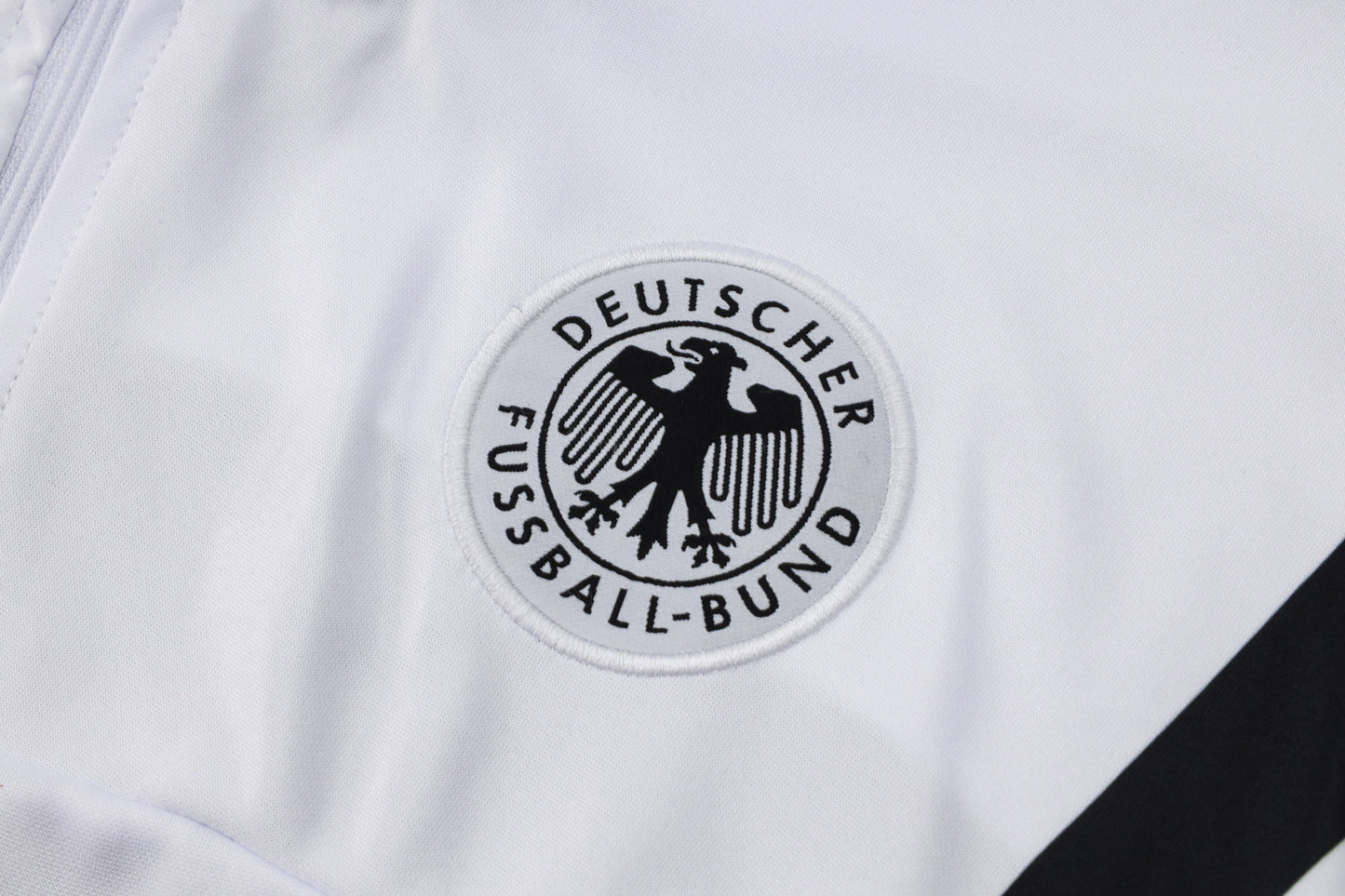 2024-25 German White (sleeves red, yellow and black) training suit