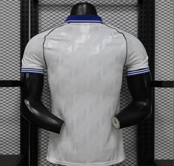 Back view of Real Madrid white jersey with blue collar and jacquard pattern