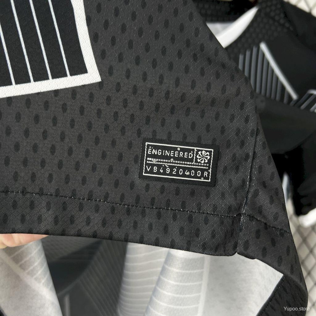 Detail of black Nike Dri-FIT fabric tag on Barcelona jersey, sports apparel